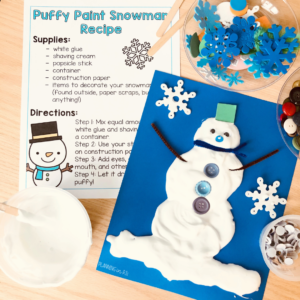 FREE Printable recipe for puffy paint snowman with just 2 main ingredients! Use white glue and shaving cream to create puffy paint. Paint on blue construction paper and add scrap items for eyes, nose, mouth and other decorations.